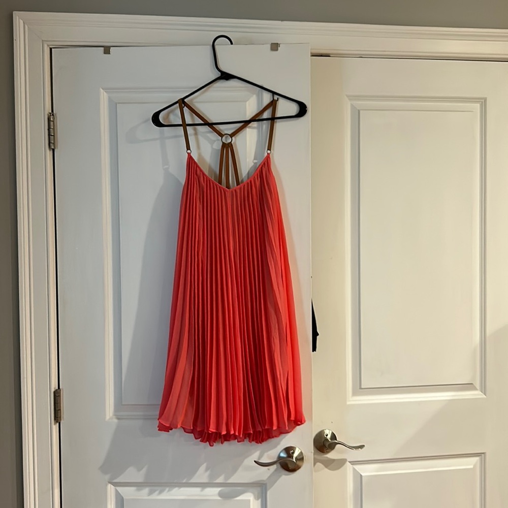 Bcbgmaxaria pleated dress with faux leather straps.